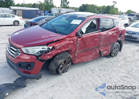 2015 Hyundai Santa Fe Sport 2.4L z USA, uszkodzony, nr VIN 5XYZUDLB0FG291926